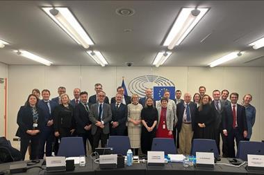 Group photo of MEPs, Council and Commission representatives who reached a deal on the EU ESG ratings regulation